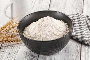 Wheat flour heap for bake photo