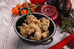 Beef liver with cream sauce photo
