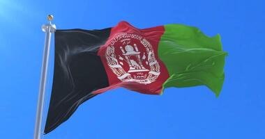 Afghanistan flag waving at wind in slow with blue sky, loop video