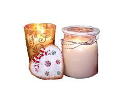 Christmas candles in glass candlesticks of gold and white color and gingerbread in the shape of a heart - color photo, isolate for design photo