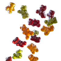 Mixed gummy bears in vibrant colors floating in mid-air, isolated on a transparent background png