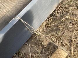 Installing wooden beds in a greenhouse photo