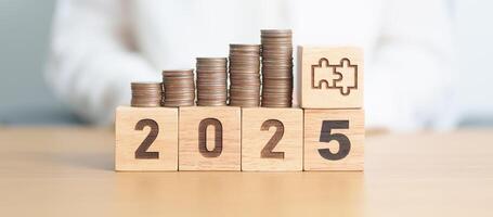 Happy New Year 2025 with Coins stack and jigsaw puzzle icon. business Process, Team, teamwork, Strategy, goal, Money, Budget, investment, financial and New Year Resolution concept photo