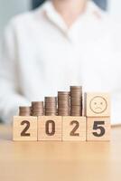 Happy New Year 2025 with Coins stack and Sad icon. goal, Money, Budget, investment, financial, savings, New Year Resolution, Satisfaction, feedback, Review and bad year concept photo
