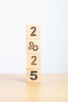 2024 year change to 2025 year block with gear icon. Business Process, Team, teamwork, Goal, Target, Resolution, strategy, plan, Action, motivation, change, brainstorm and New Year start concepts photo