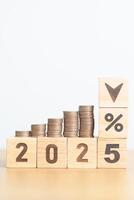 2025 New year with percentage change to UP and Down arrow with coin stack. Interest rate, GDP, stocks market, financial, deflation and Inflation, mortgage, debt, Loan and Economic Recession photo