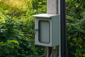 switchboard type electrical cabinet is responsible for controlling the supply of electricity from a power source or transformer to various devices that need to use electricity. photo