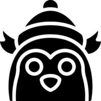 A black and white penguin with a hat vector