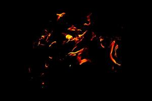 Fire flame texture. Burning material backdrop. Burn effect pattern. Blaze and torch wallpaper. Heat and haze backdrop. photo