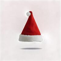 A red Santa hat with white fur trim and pom-pom, isolated on transparency background. Christmas holiday season concept photo