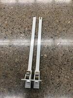 Parts of a Plastic Shelf Pusher System for Retail Merchandising photo