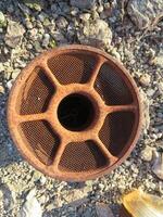 Rusty Old Filter at Abandoned Mine Site in Arizona Desert photo