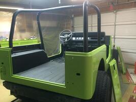 Fun DIY Lime Green Paint Job, Back of 1990s 4x4 Vehicle photo