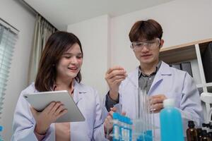 Laboratory Scientists Engaging in Chemical Experimentation with Advanced Tools photo