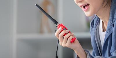 Focused Communication by Female Engineer Using Radio for Effective Project Management photo