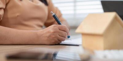 Client Evaluating Real Estate Agreement before Signing photo