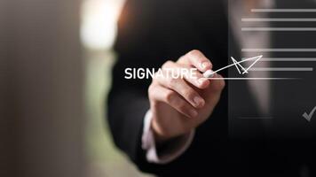 Businessman validates and manages business documents and agreements ,legal contract ,signing business contract approval ,joint venture agreement ,contract documents confirmation ,guarantee correctness photo