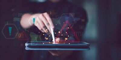 Programmer and virtual icons , exclamation mark ,alarm,computer virus detected ,danger warning concept or information error that should be urgently fixed and repaired ,Notification of security issues photo