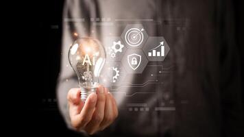 AI ,Businessman showing concept, connection, innovation development and artifacts too artificial intelligence ,ideas and innovation ,Machine learning ,science and technology photo