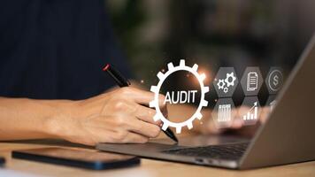 Accountant showing office document auditing concept ,plan review process and assess correctness ,Management of important document storage of organization ,document system ,accountant Audit documents photo