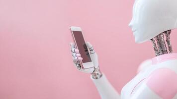 AI robot using smartphone on pink background photo