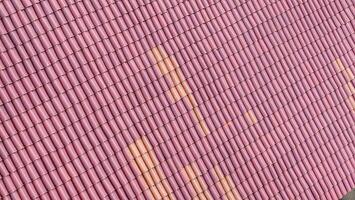 a red roof with yellow spots on it photo