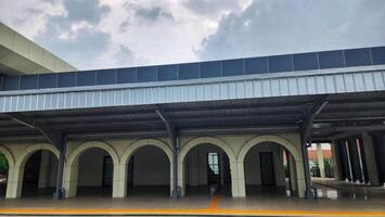 the train station is empty and has arches photo