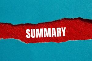Summary message written on ripped torn blue paper on red background. Conceptual summary symbol. Copy space. photo
