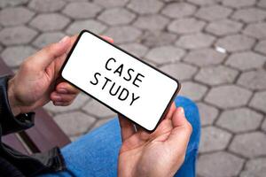 Case study message written on smartphone screen. Conceptual case study symbol. Copy space. photo