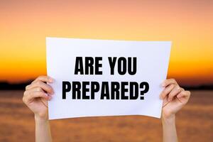 Are you prepared question written on white paper with blurry lake background. Conceptual are you prepared question symbol. Copy space. photo