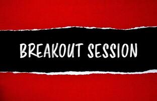 Breakout session message written on ripped torn red paper with black background. Conceptual breakout session symbol. Copy space. photo