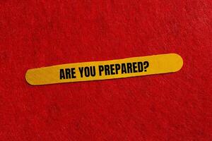 Are you prepared question written on yellow wooden stick with red background. Conceptual are you prepared question symbol. Copy space. photo