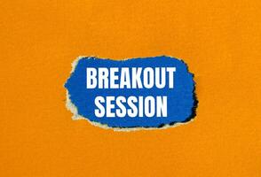 Breakout session message written on ripped torn orange paper with blue background. Conceptual breakout session symbol. Copy space. photo
