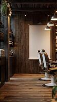 Barber chairs in a barber shop with a projector screen photo