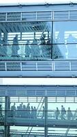 Modern Building Interior with Diverse People in Transit and Movement Throughout the Space video