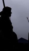 Silhouettes representing Two Figures in a Dramatic and Engaging Scene of Emotion video