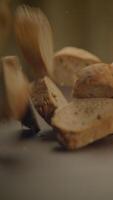 An upclose view of a nut falling onto a rustic wooden surface, capturing the essence of nature video