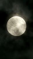 The Moon is Illuminating a Cloudy Night Sky, creating an enchanting and mysterious atmosphere video