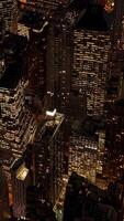 An Aerial View of a Beautiful City Skyline that is Illuminated at Night and Dazzling video