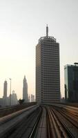 A breathtaking Urban Skyline View complete with Rail Tracks prominently seen in the Foreground video
