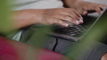 Close up of male hand typing on laptop computer keyboard and surfing the internet, online, working, business and technology, internet network communication concept. video