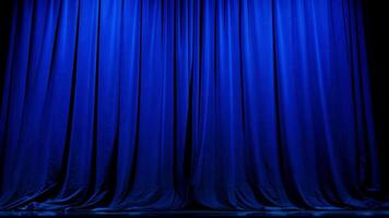 The deep blue curtains create a striking backdrop, evoking anticipation for an upcoming performance in a theater setting during the evening hours. video