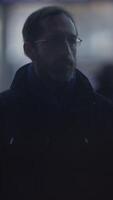A mysterious man is observed in an urban setting, creating an intriguing atmosphere video