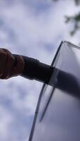 A CloseUp View of a Sleek and Modern Object Set against a Clear and Bright Blue Sky video