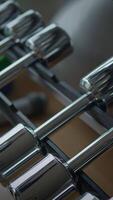 Closeup view of Modern Dumbbells Positioned and Ready for a Workout Session Ahead video