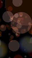 An abstract representation of bokeh lights beautifully displayed on a dark background video