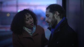 An emotional interaction unfolds between two distinct individuals in the beautiful dusk light video