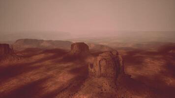 Aerial view of monument valley at dusk with dramatic shadows video