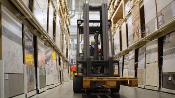 Forklift loader. Pallet stacker truck equipment in tile shop video