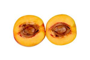 Beautiful peach halves isolated on white background photo